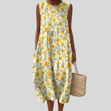 Weisses Kleid mit gelben Blüten