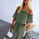 Nikola – Eleganter Jumpsuit mit schulterfreien Trägern und Taillierung