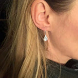 Elegante Ohrringe im Dandelion-Blatt-Design
