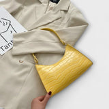 Cécile. - Glänzende Lederhandtasche