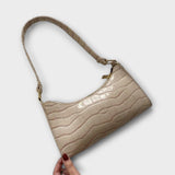 Cécile. - Glänzende Lederhandtasche