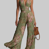 Amelia – grüner, plissierter Jumpsuit mit Blumenmuster
