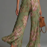 Amelia – grüner, plissierter Jumpsuit mit Blumenmuster