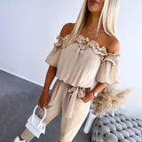 Nikola – Eleganter Jumpsuit mit schulterfreien Trägern und Taillierung