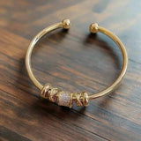 Verstellbares Armband mit Goldfarbene Anhängern