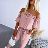 Nikola – Eleganter Jumpsuit mit schulterfreien Trägern und Taillierung