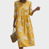 Iara - Midi-Kleid mit Pflanzen- und Blumenmuster